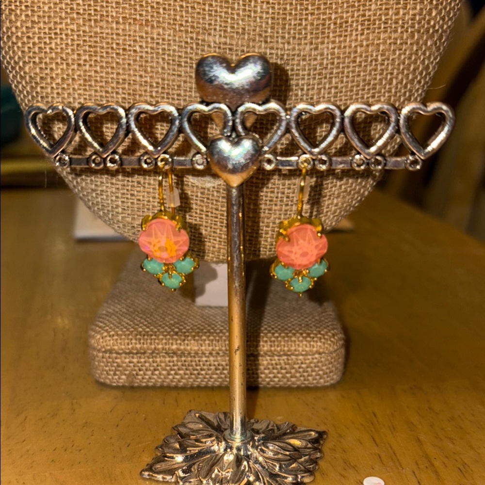 Elegant Floral Earrings with Gold Accents and earring stand